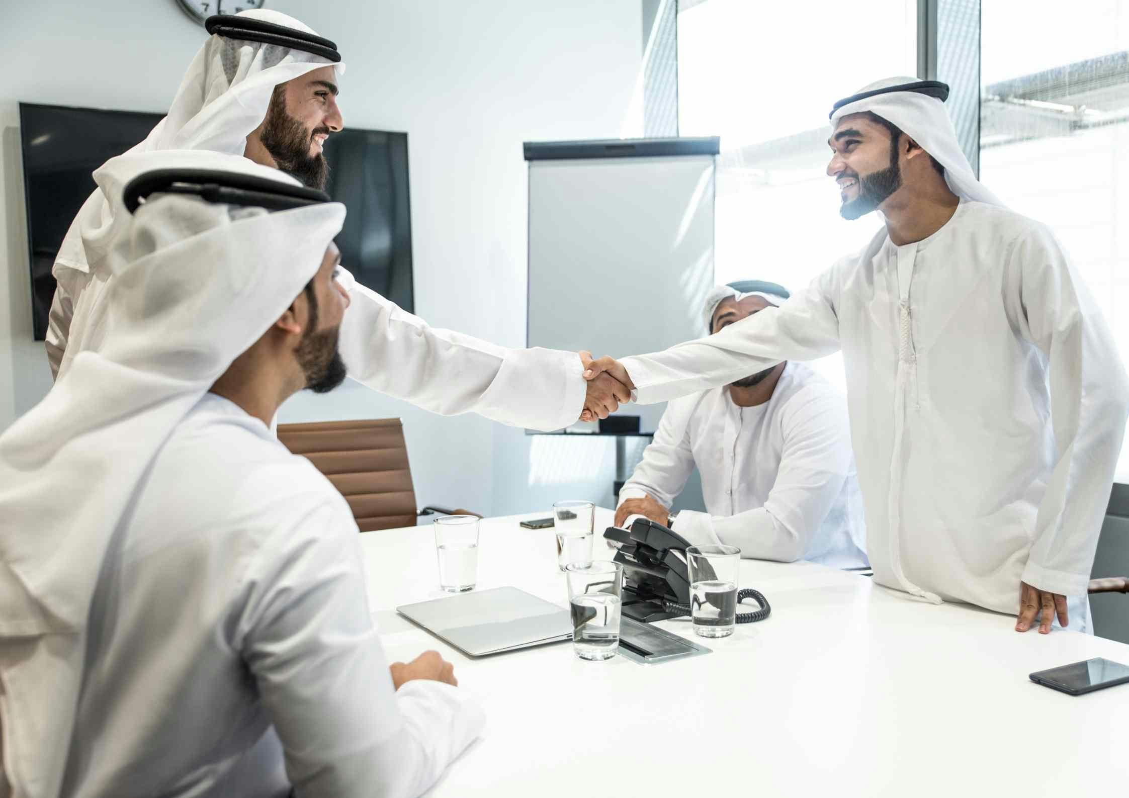 arab men shaking hands